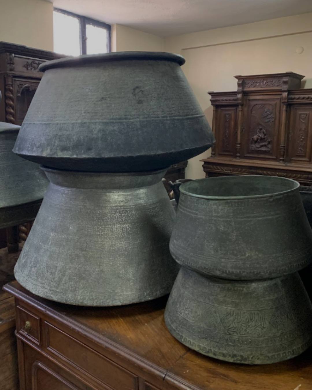 Hammered copper vessels prepared for crating