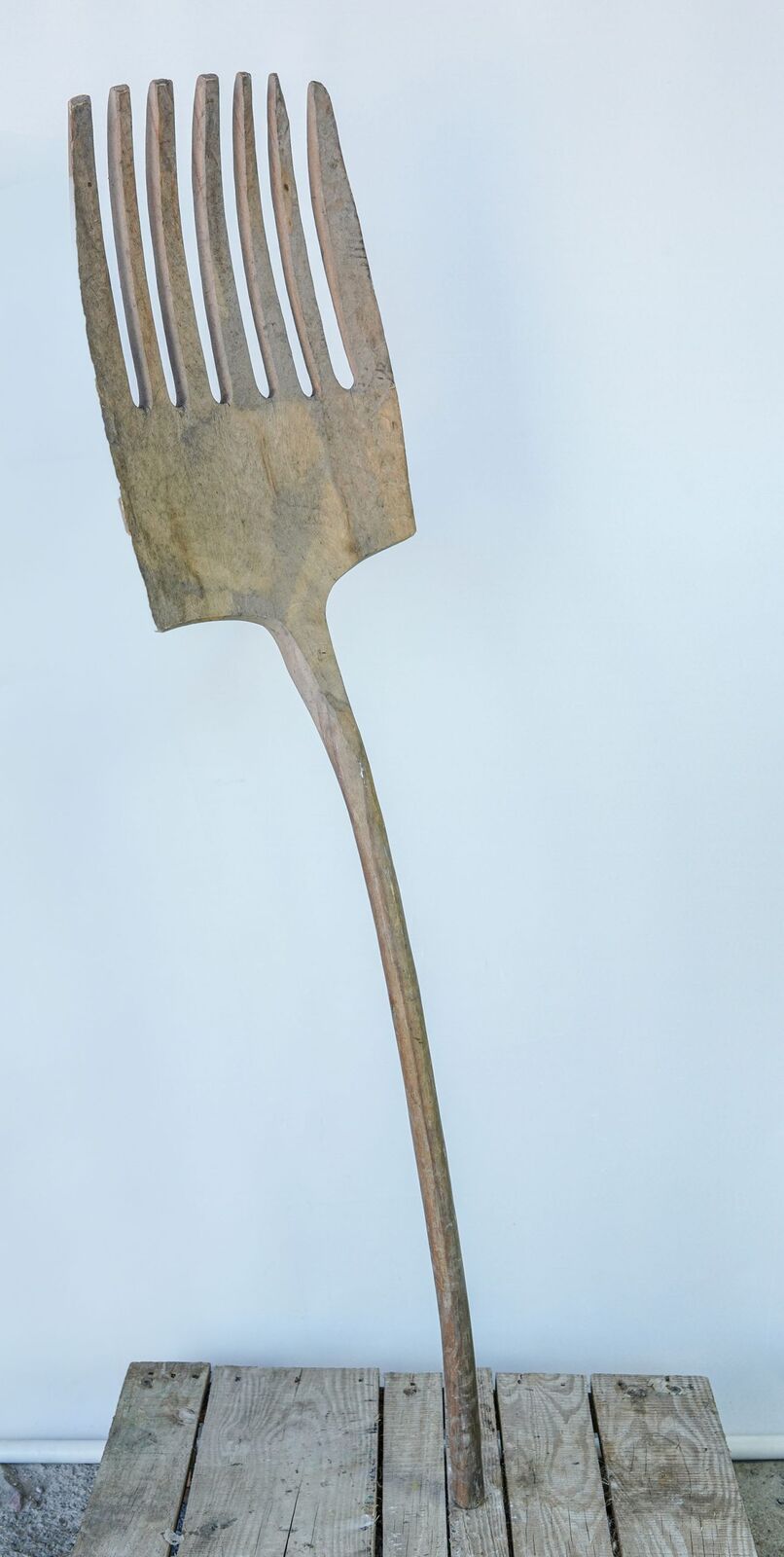 Wooden Pitchfork — wooden pitchfork with wide tines and a pale handle