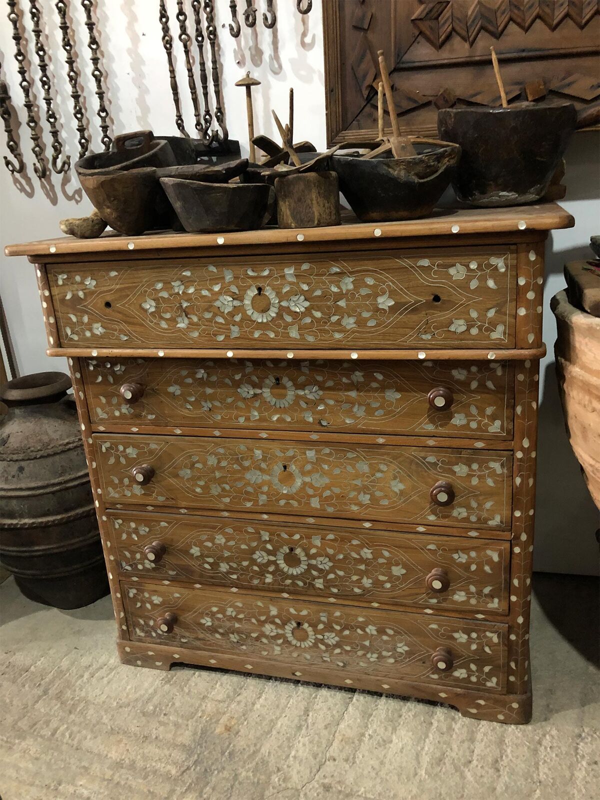 Inlaid Chest of Drawers — wooden chest of five drawers inlaid with pale floral patterns