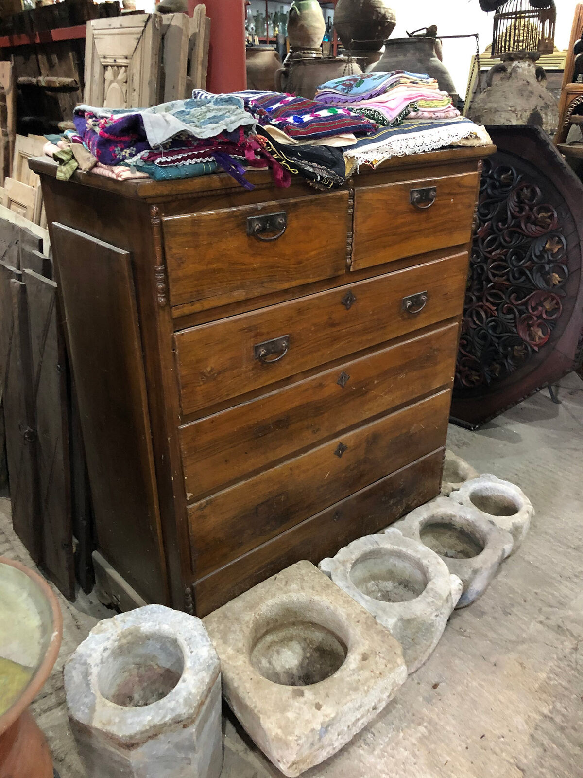 Wooden Chest of Drawers — honey-brown wooden chest of drawers with metal handles