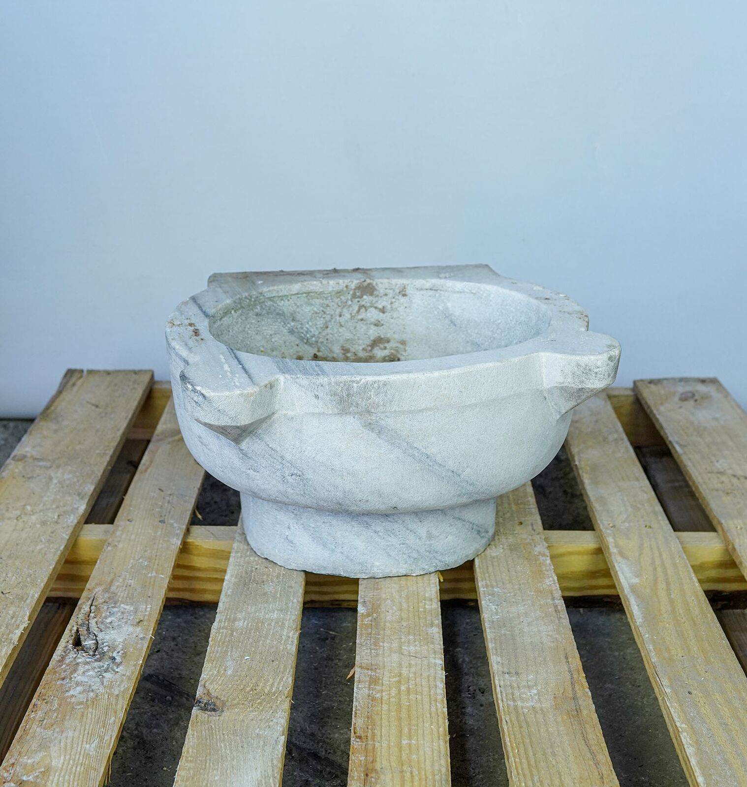 Marble Wash Basin — marble hammam basin with lugs in three-quarter view