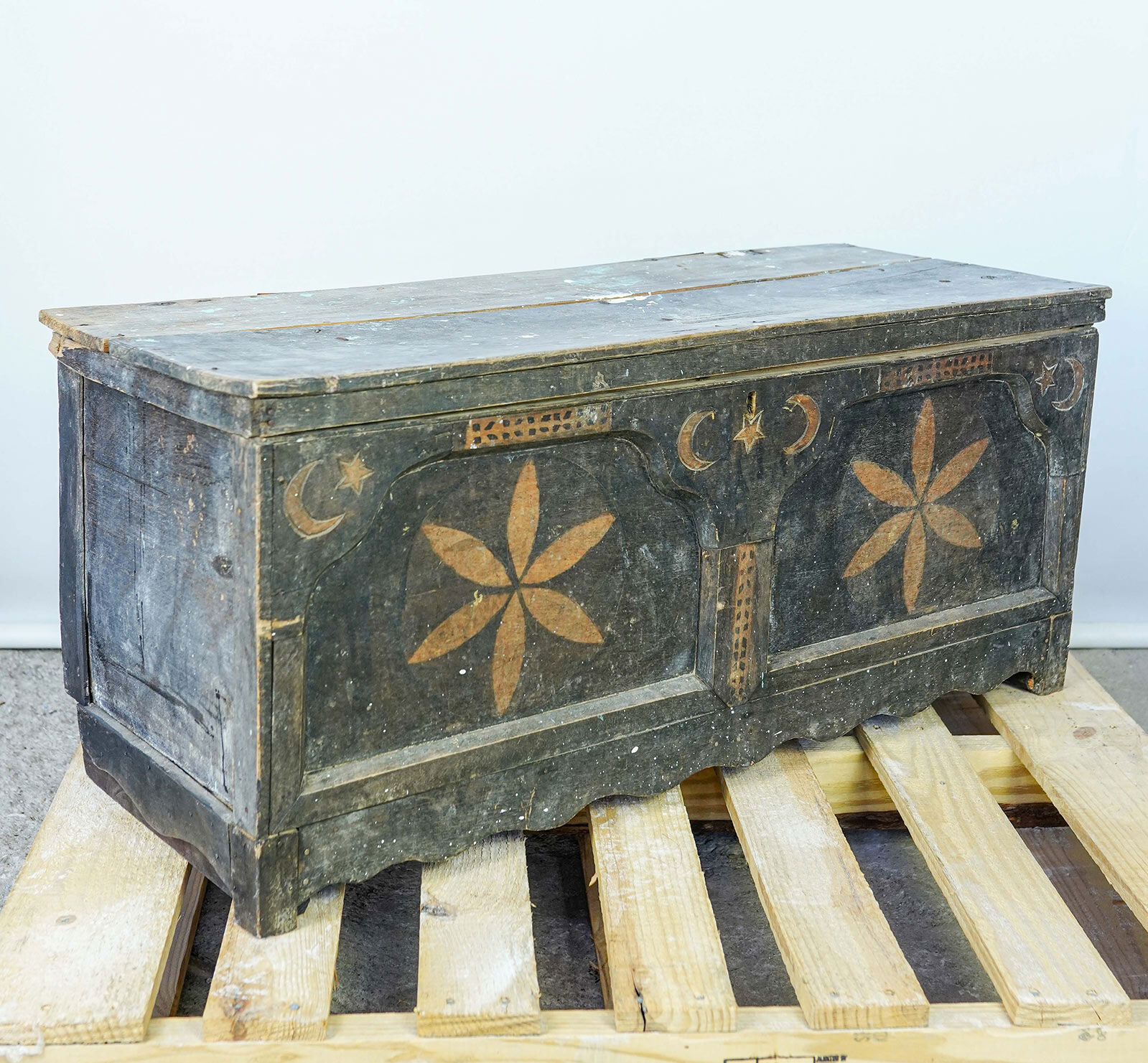 Wooden Chest, Carved and Painted — dark green painted chest with large star rosettes