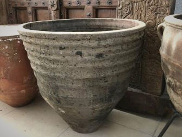 Olive Dağar Jar, III — wide conical clay jar with ribbed bands and a flared rim