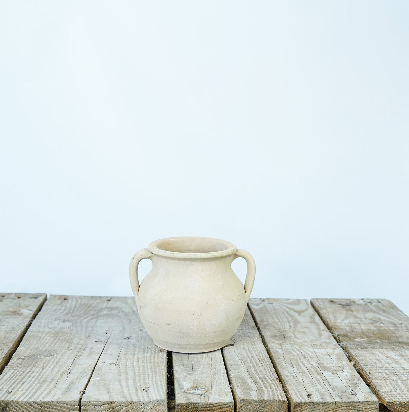 Avanos Yogurt Jar — cream jar with two small handles on a wooden pallet