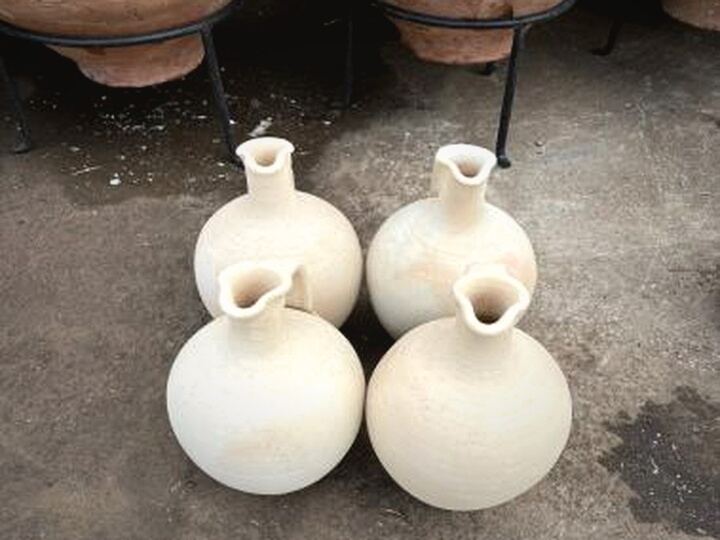 Avanos Water Jug — four cream round water jugs with pouring spouts