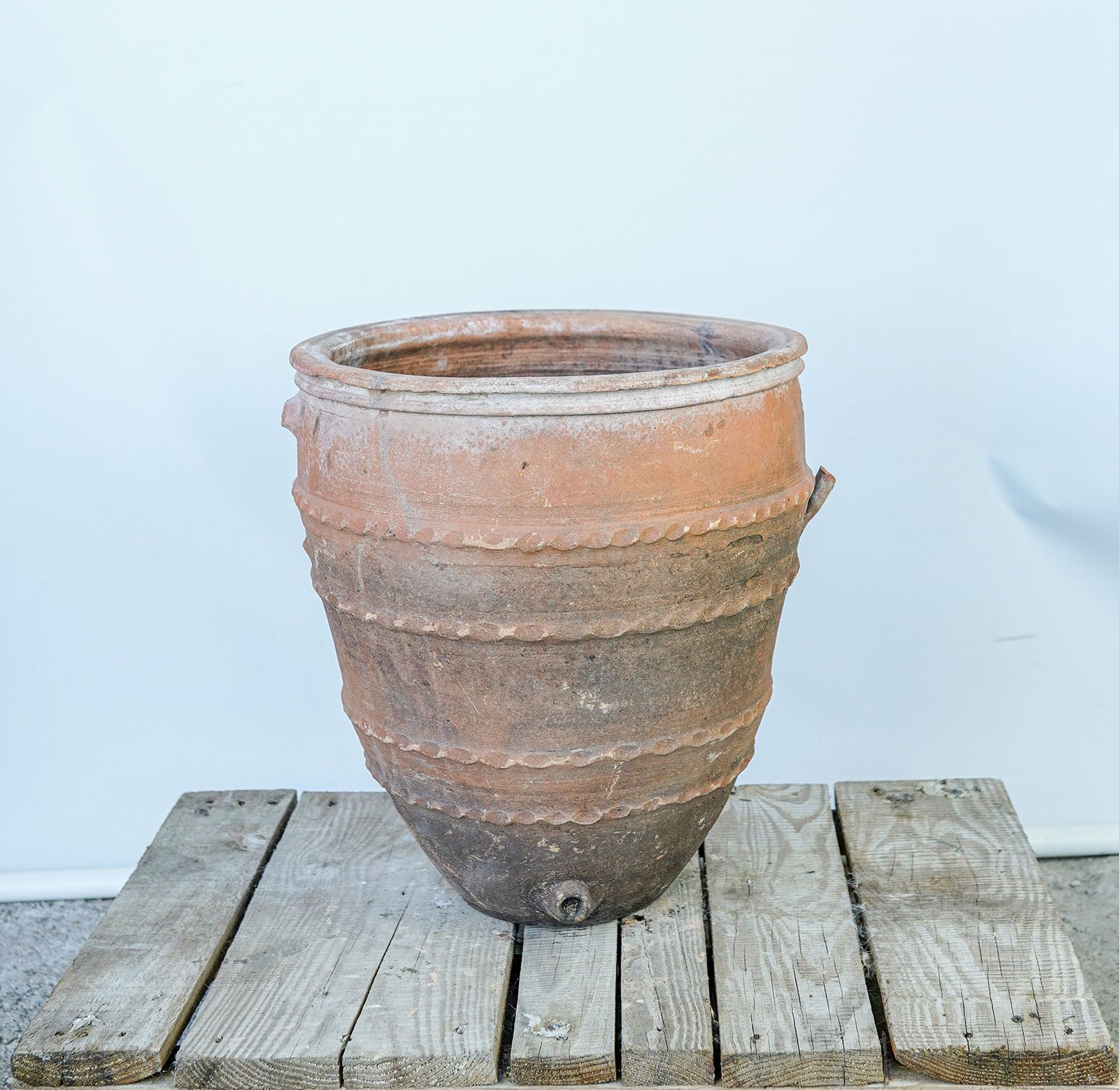 Ribbed Dağar Jar with Spout Hole — banded terracotta dagar jar with a small spout near the base