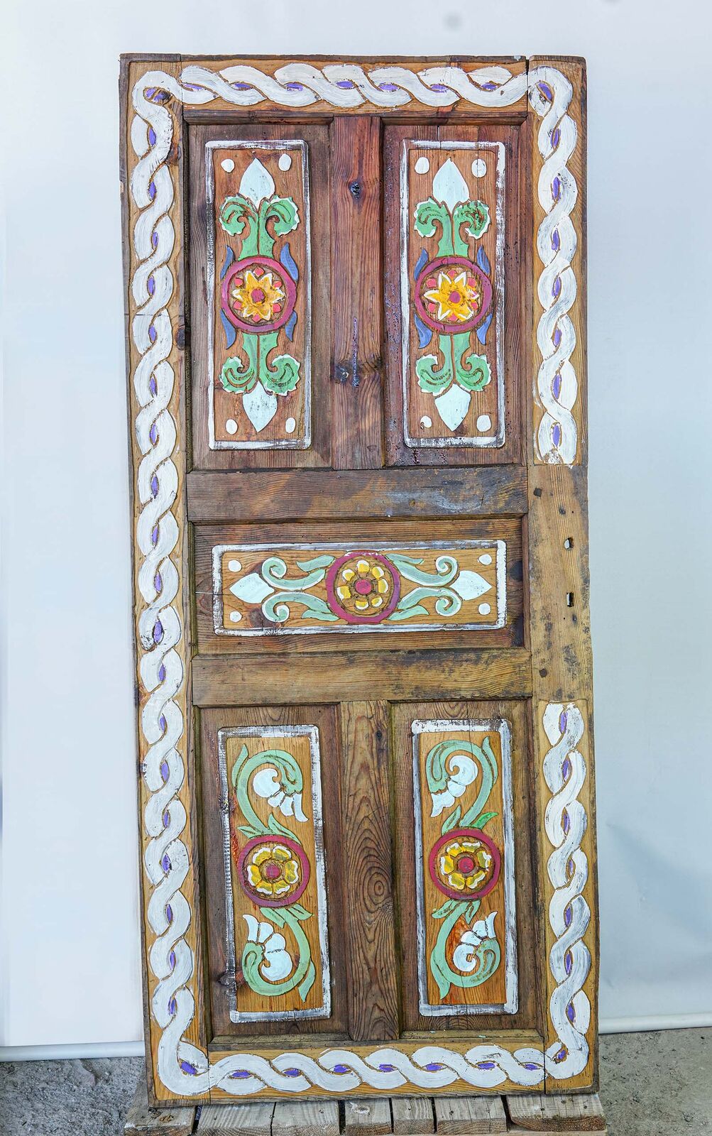 Painted Door, Floral Panels — wooden door painted with colourful floral panels and a patterned border