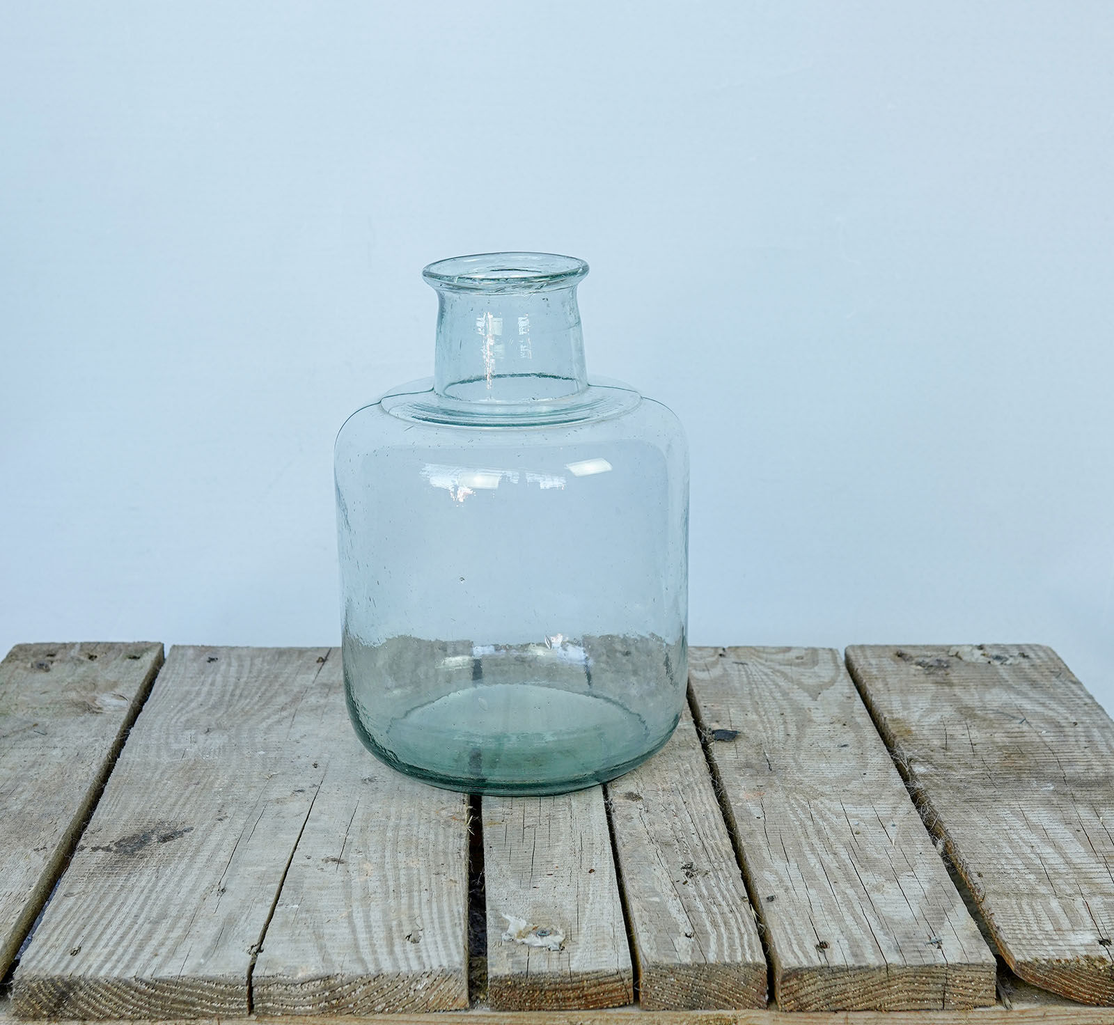 Hand-Blown Glass Jar — clear glass jar with a straight body and narrow neck